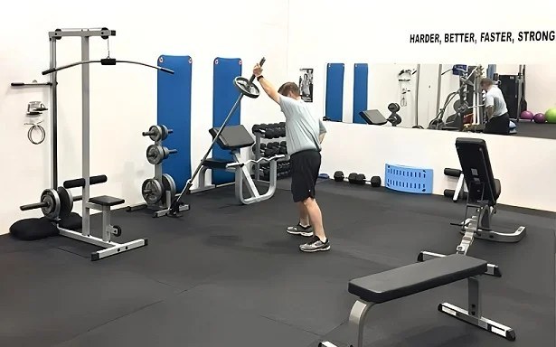 Dumbbells on the turf in the Northbrook studio