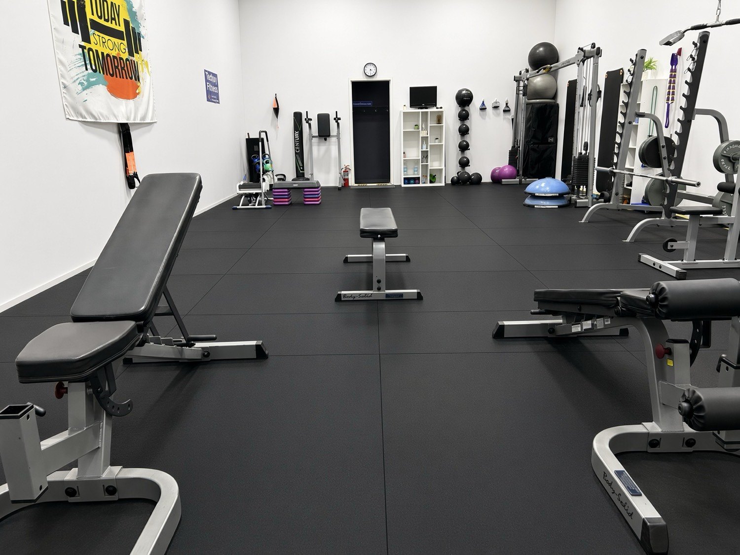 Benches and equipment at the other end of the studio